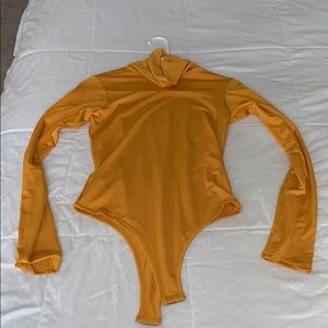 Yellow bodysuit